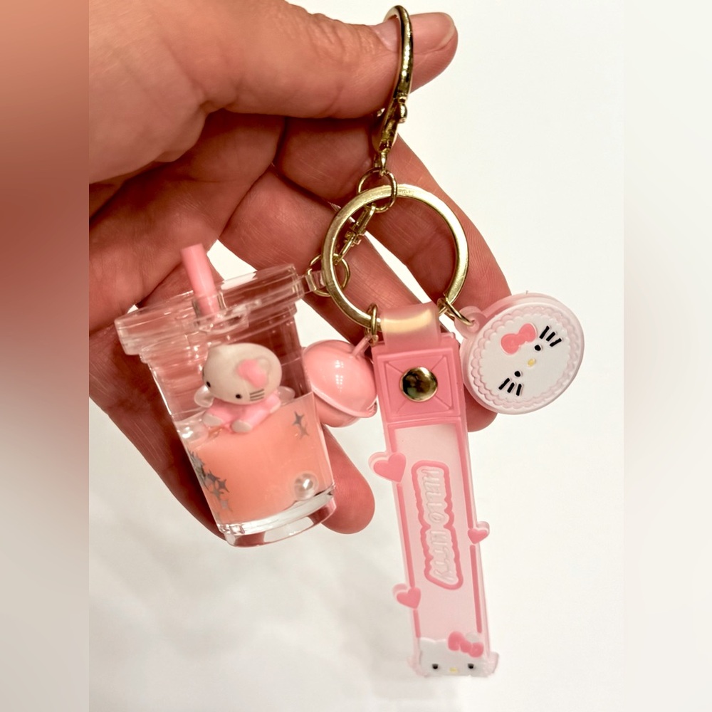 Pink Hello Kitty in Cup with Pink Strap and Charms Bag Purse Charm / Keychain.
